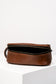 Toiletry bag with brown handle